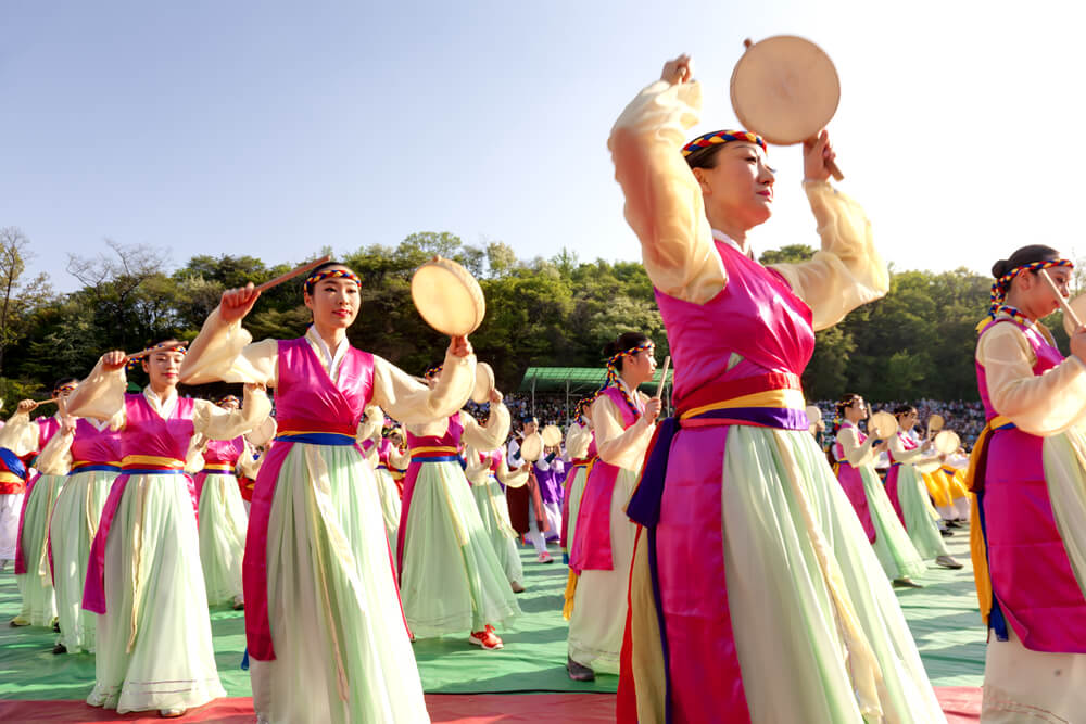 Actresses are performing at Buddhist Cheer Rally for celebration of Lotus Lantern Festival at Dongguk University Stadium, Seoul, Korea.