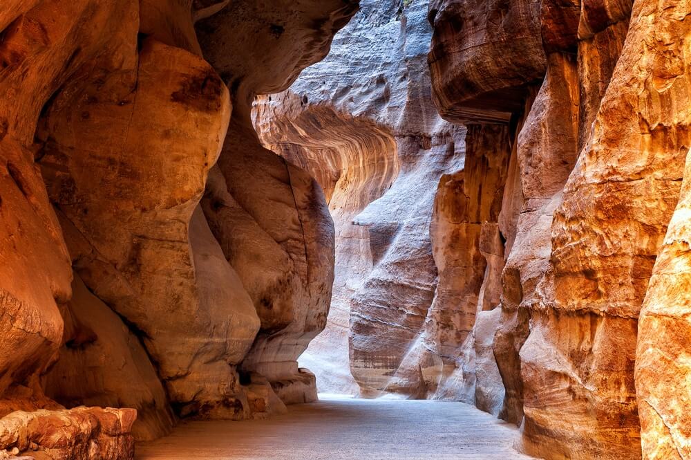 The Siq - stone gallery to the hidden city of Petra, Jordan. UNESCO World Heritage Site